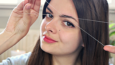 بالفيديو: الطريقة الصحيحة لإزالة شعر الوجه بالفتلة