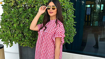 Rock Your Pregnancy Outfit with the Short 70s Dress like Deema Al Asadi