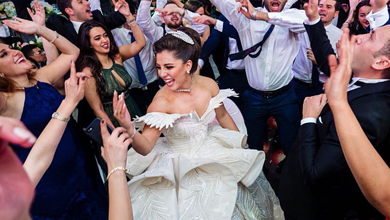 A Bride Shares Her Secret to Dancing All Night in a Huge Wedding Dress