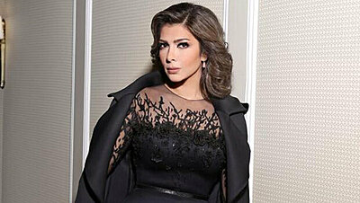 Asala Nasri Stands Out in a Lace Nicolas Jebran Dress