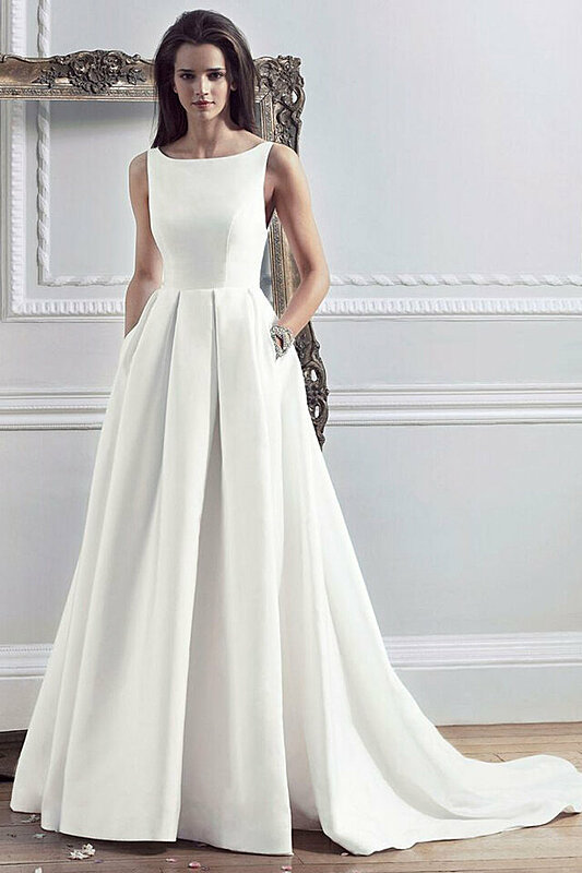 بالصور: تألقي يوم زفافك بفستان زفاف بسيط ومميز