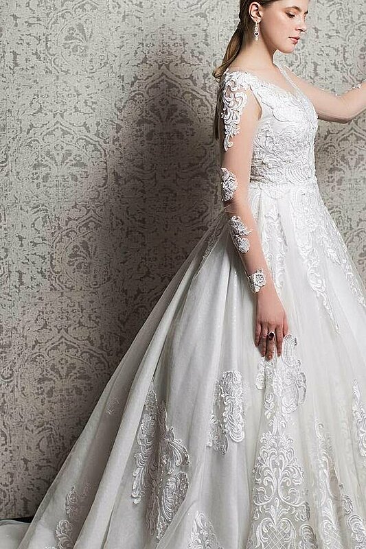 الأكمام التل هي الأجمل لفستان زفافك في 2018