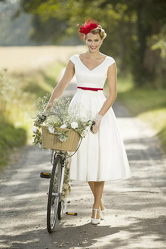 بالصور: أجمل فساتين زفاف قصيرة مناسبة للصيف