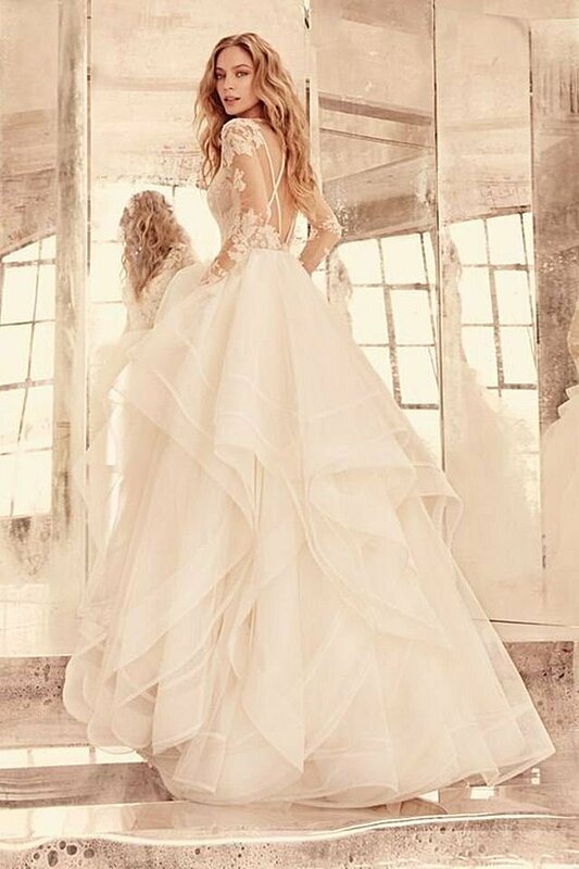 أشكال فساتين زفاف بأكمام طويلة لإطلالة راقية ومحتشمة للعروس