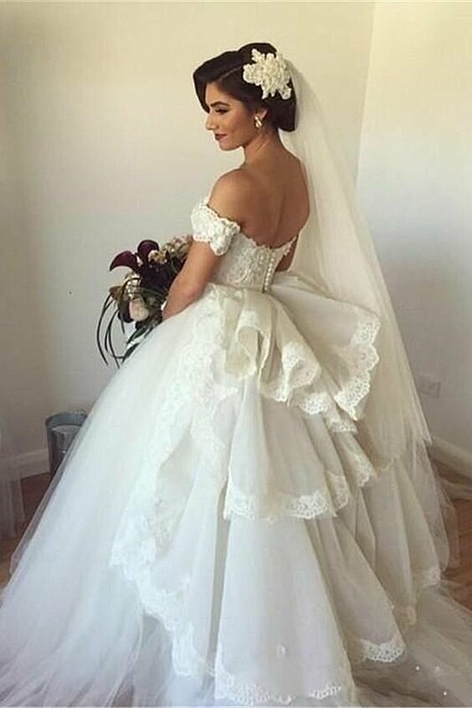 ٢٨ فستان زفاف منفوش ستقع كل عروس في حبه