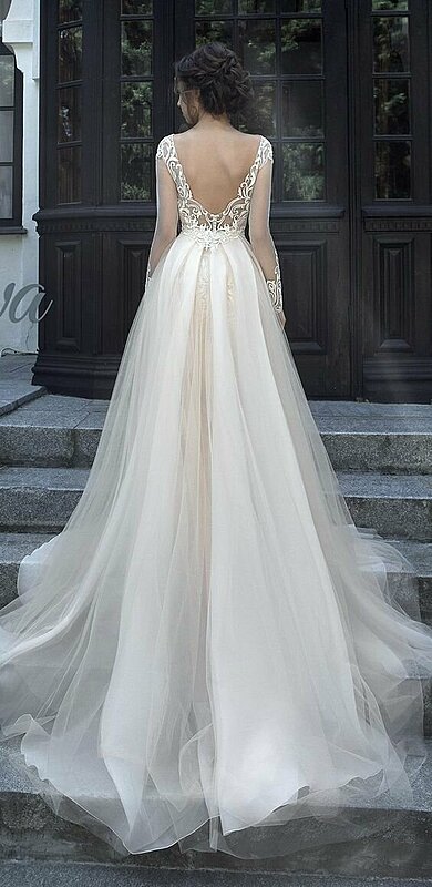 ١٥ فستان زفاف من التل حلم كل عروس رقيقة