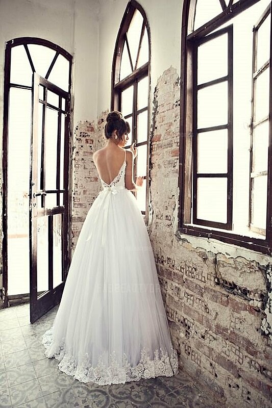 ١٥ فستان زفاف من التل حلم كل عروس رقيقة