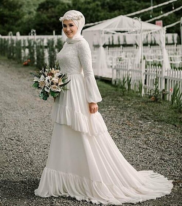 لن تحتاري في اختيار فستان زفاف مناسب لحجابك... هذه آخر صيحات 2019