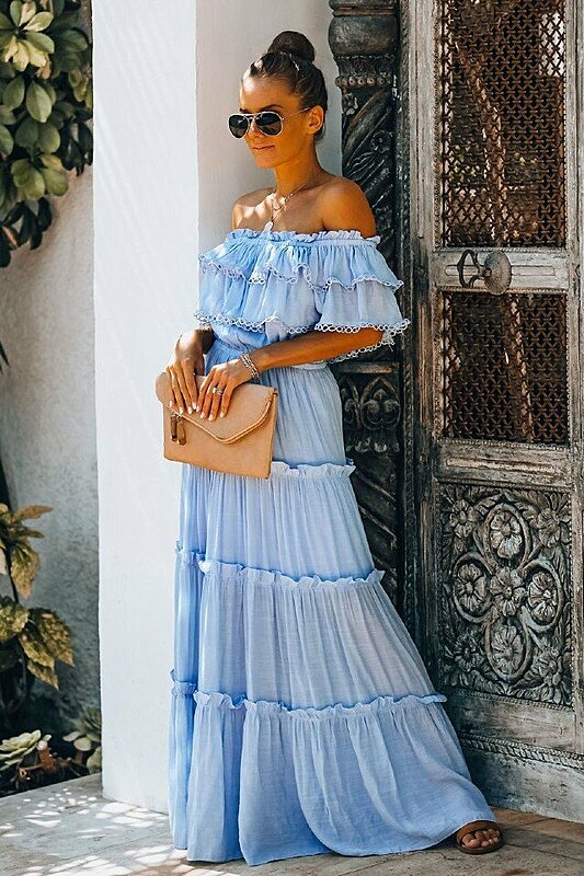 https://api.fustany.com//fustany/slider/3802/image/37798/medium_800_friday_fashion_fits_how_to_wear_and_style_flowy_dresses_fustany_image_30.jpg