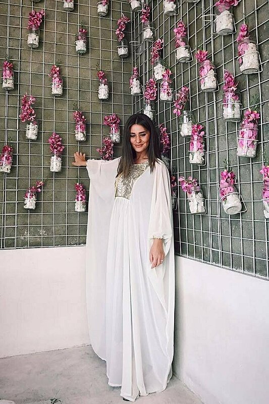 15 Arab Fashion Girls Show Us How to Wear Abayas and Kaftan Dresses in Ramadan