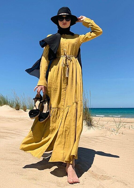 ستايل الجمعة: أفكار متنوعة لارتداء الفستان الطويل مع الحجاب