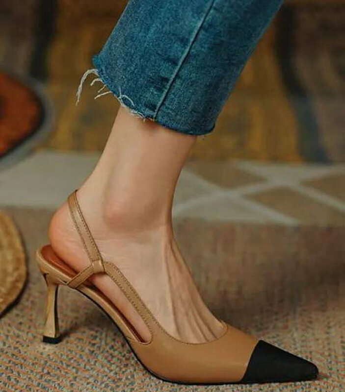 beige sandal, a versatile footwear choice that complements various outfits.